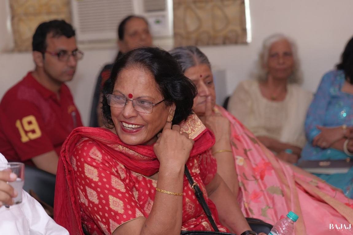 Sharing laughter with friends at a celebration