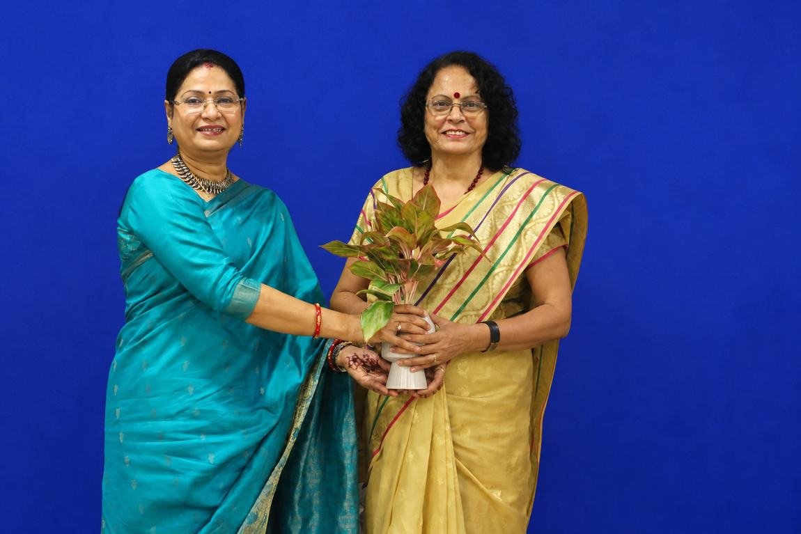Presenting a token of appreciation at a special occasion