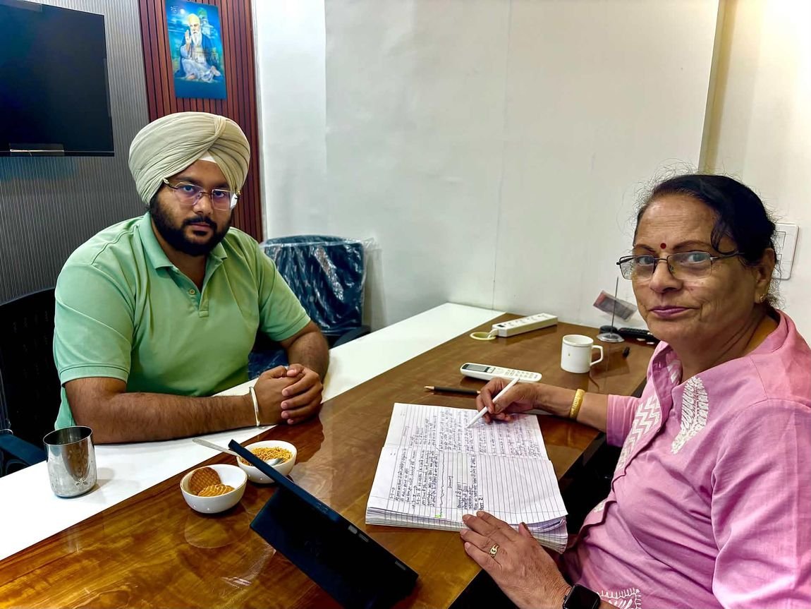 Seated with a client during a personal numerology consultation