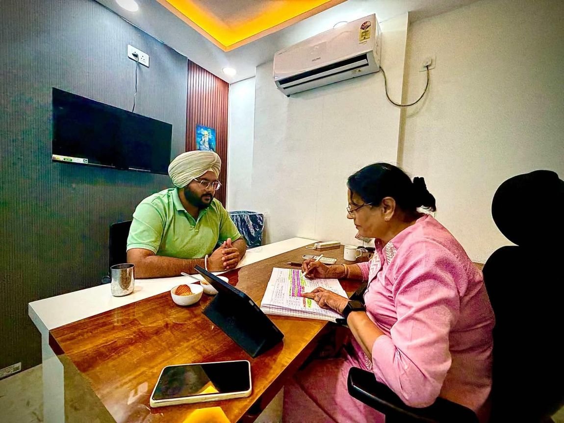 Working through a client's numbers together at the office