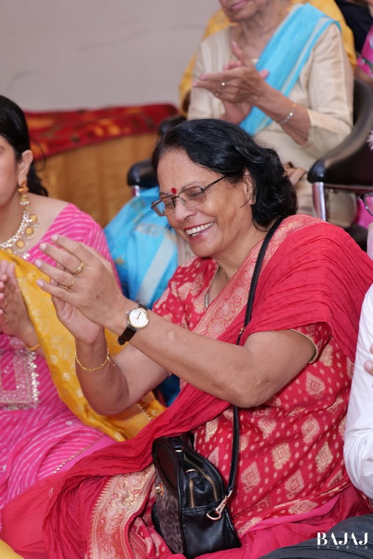 Mahima Numiro with clients at an event