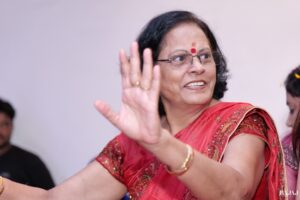 Mahima Numiro teaching numerology at a workshop